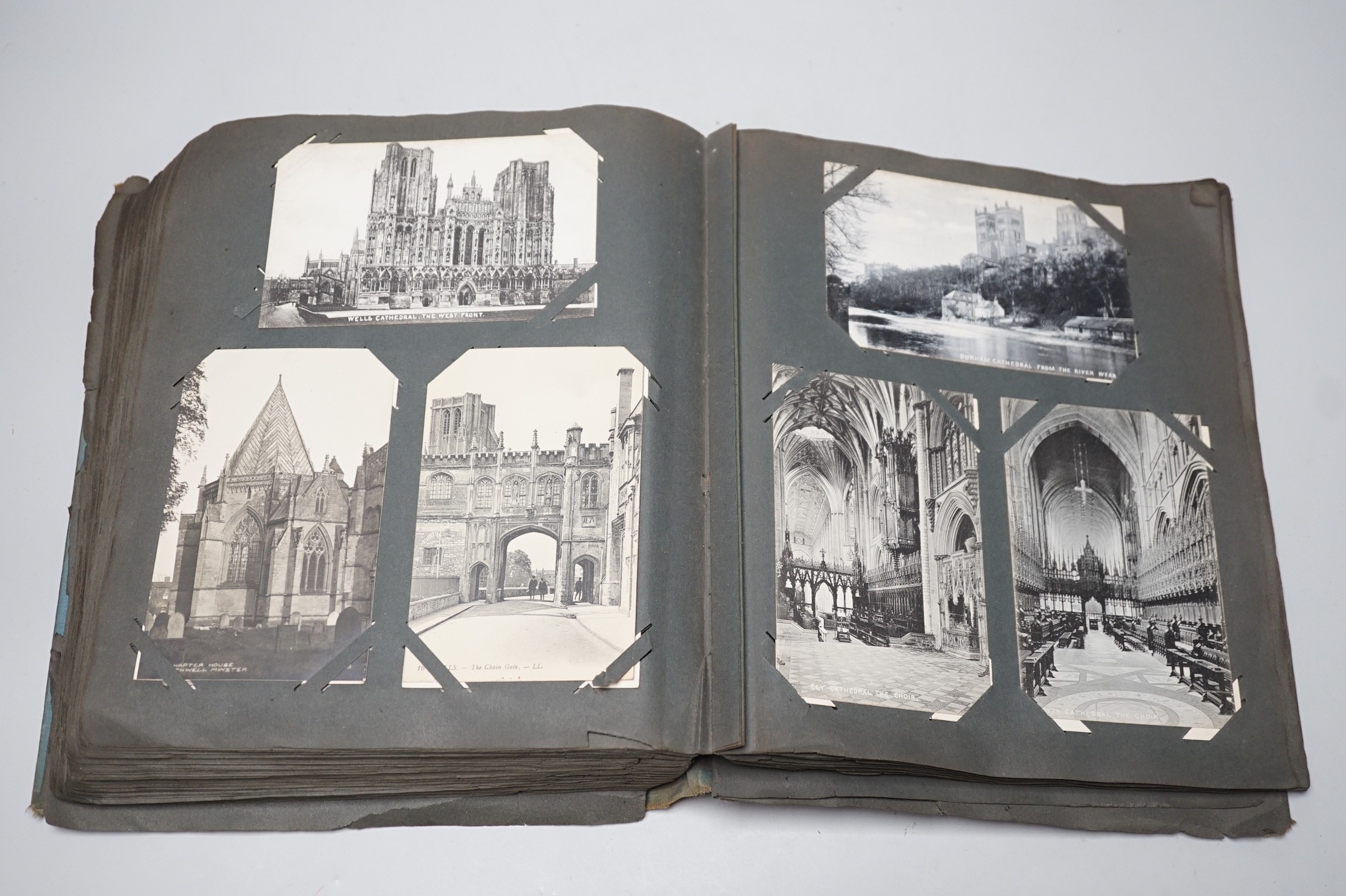 Three albums of topographical postcards